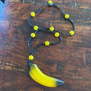 Jianhui London Yellow & Black Wood Necklace with Banana Pendant
Funky Unique Art